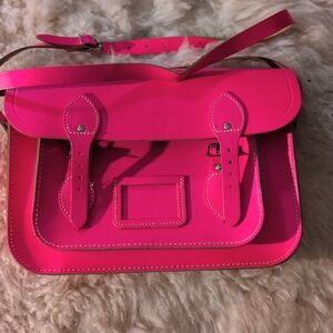 Vibrant Pink Satchel with Adjustable Strap and Silver Hardware